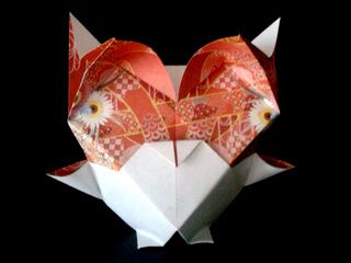 A cute origami owl with a beautiful pattern
