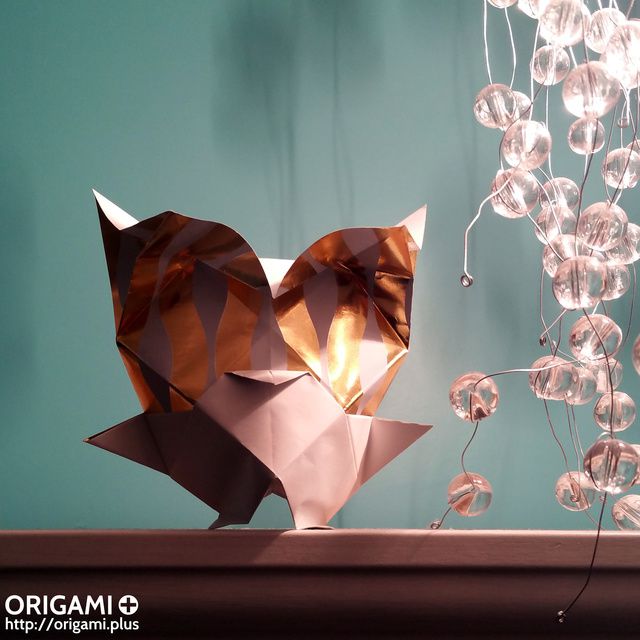 This origami owl can easily stand up on its feet, and you can put it some paper owls on top of any place in your home! :-)
