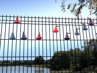 Colorful origami sailboats in La Rochelle, France