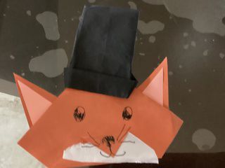 Very cute origami cat with hat folded by Fabian Diaz