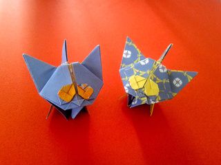 Two beautiful blue origami kittens