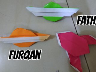 Origami planets and space rocket by Fathir and Furqan