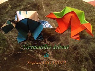 Two colorful origami frogs