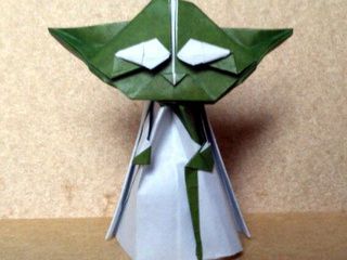 Origami Yoda in a white coat with his stick
